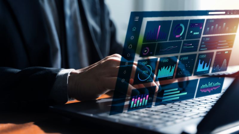 Depiction of RapidStart business applications above laptop